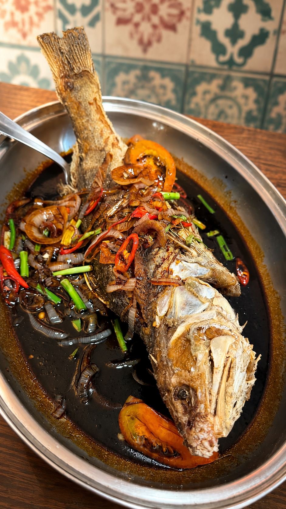 Whole fish braised with soy, chilli and spring onion